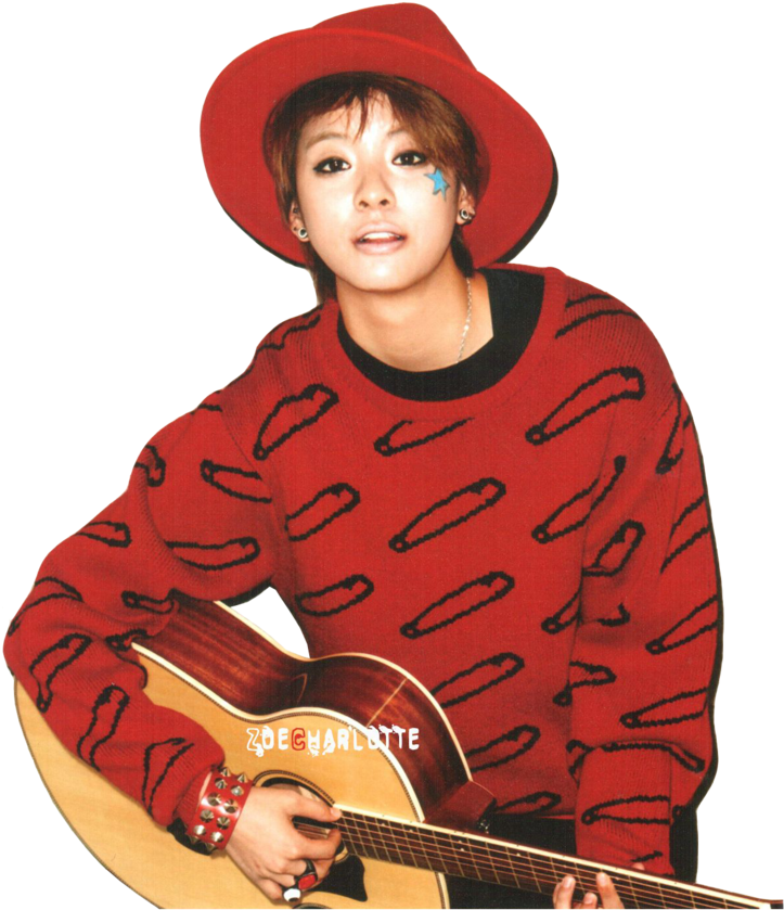 A Woman In A Red Hat And Red Sweater Holding A Guitar