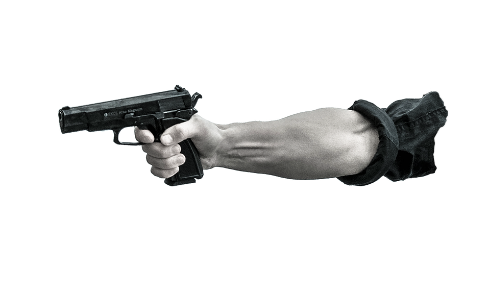 A Hand Holding A Gun