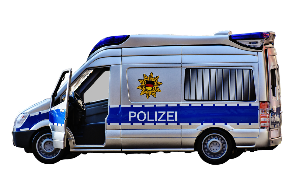 A Police Van With The Door Open