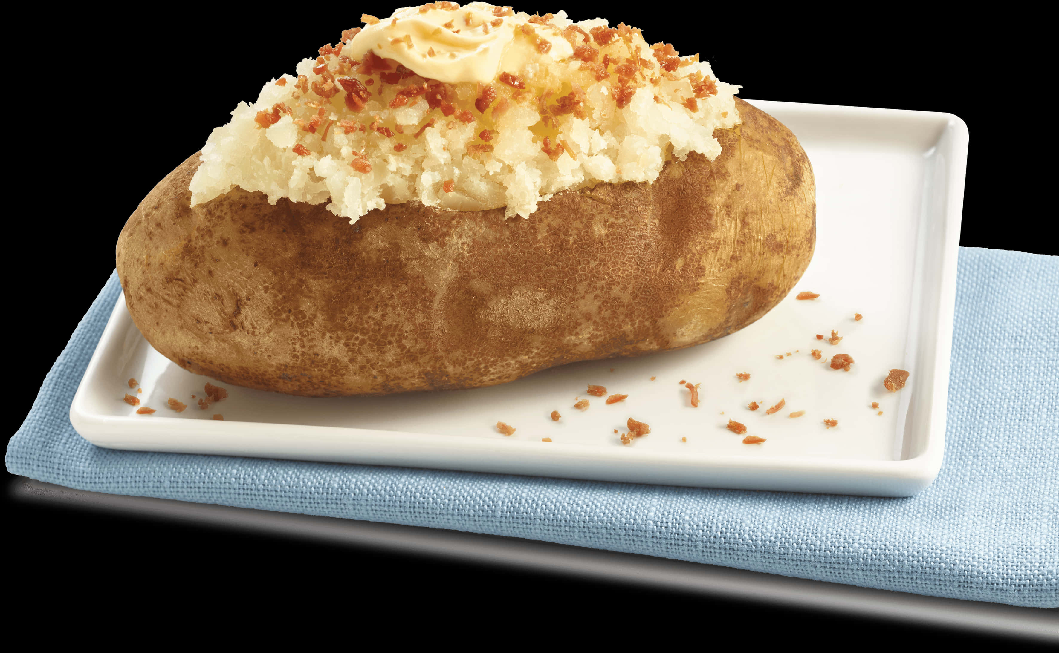 A Baked Potato With Mashed Potatoes On A Plate