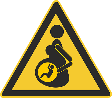 A Yellow Triangle Sign With A Pregnant Woman Holding A Baby