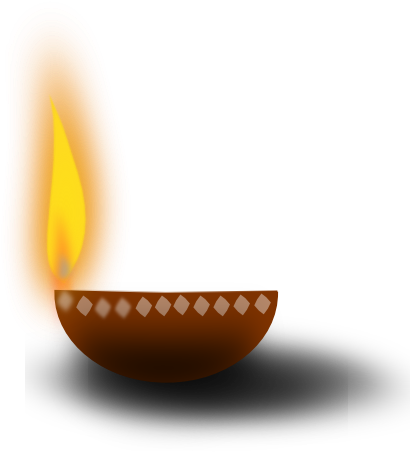 A Lit Candle In A Bowl
