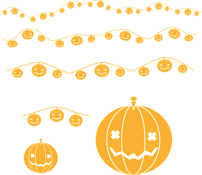 A Line Of Pumpkins And Lights