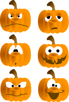 A Group Of Pumpkins With Different Faces