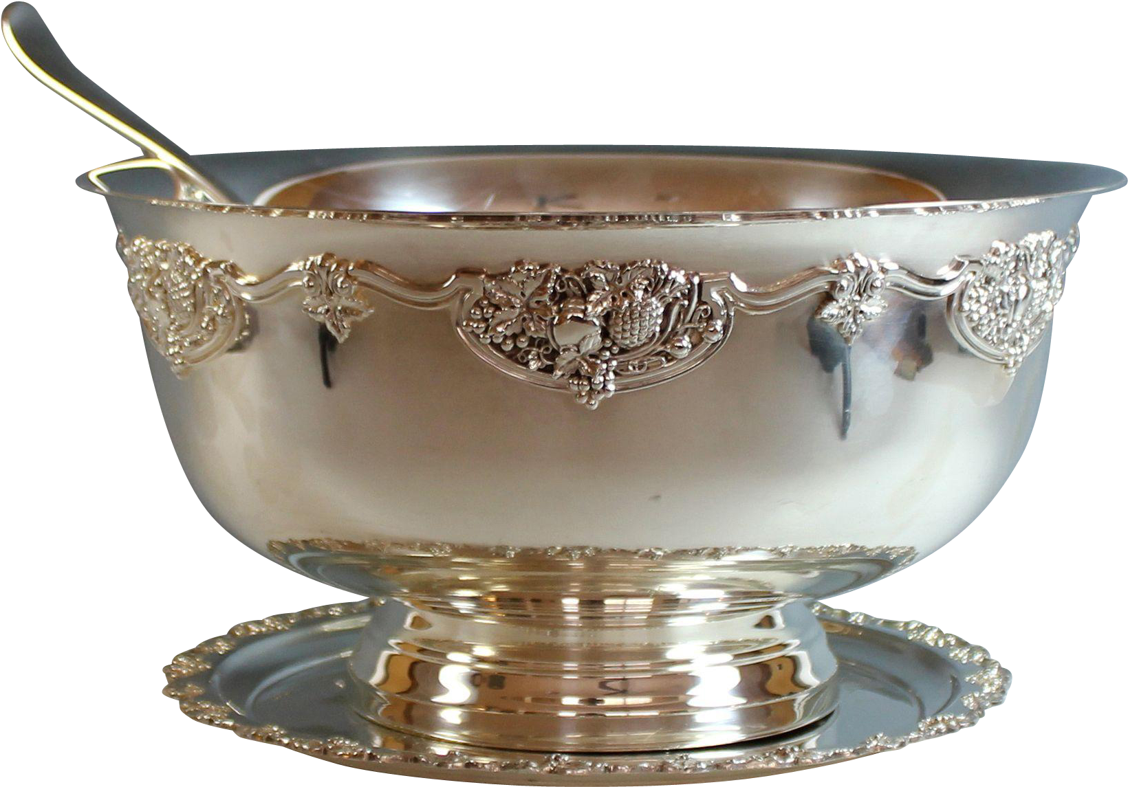 A Silver Bowl With A Spoon