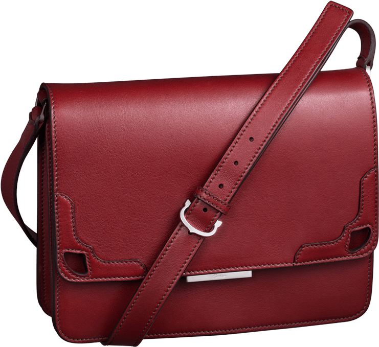 A Red Leather Bag With A Strap
