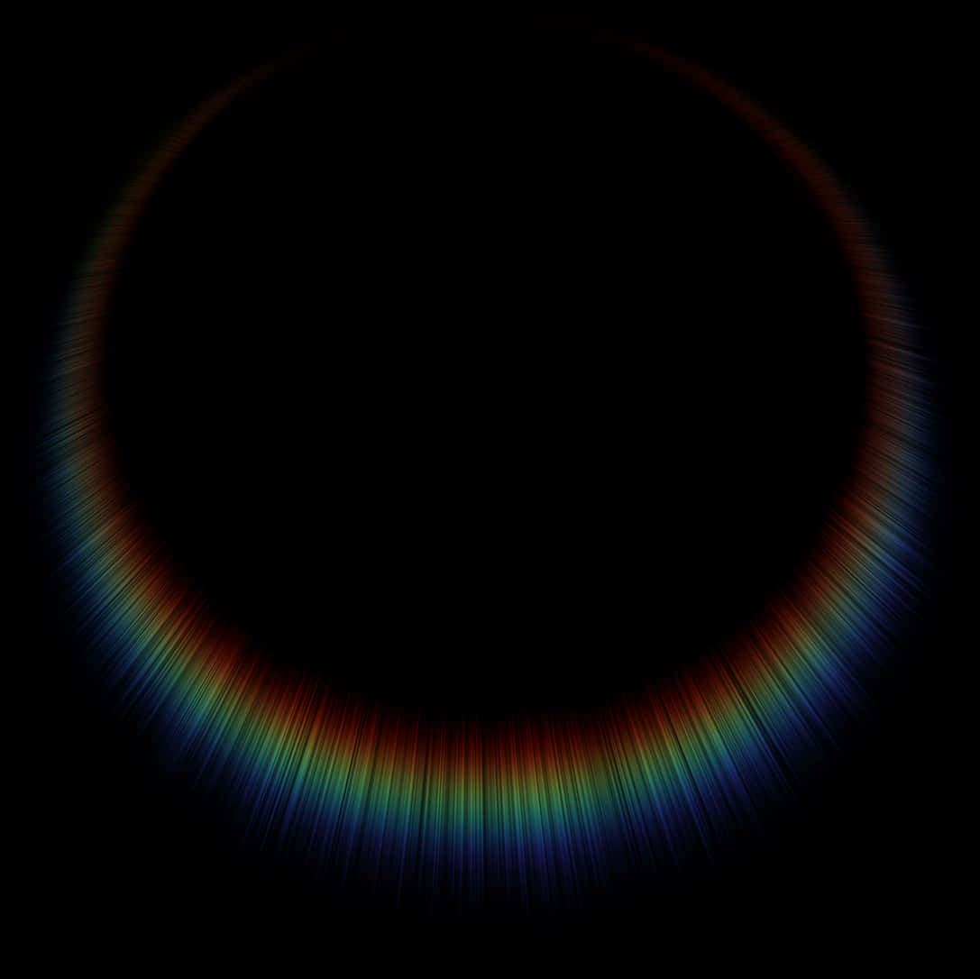 A Rainbow Colored Circle In A Black Background
