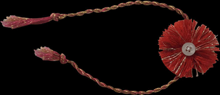 A Close-up Of A Red And Gold Rope