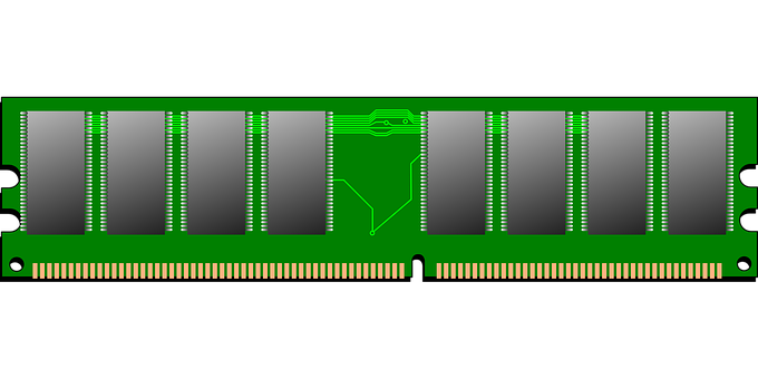 A Green Circuit Board With Silver And Grey Rectangular Objects