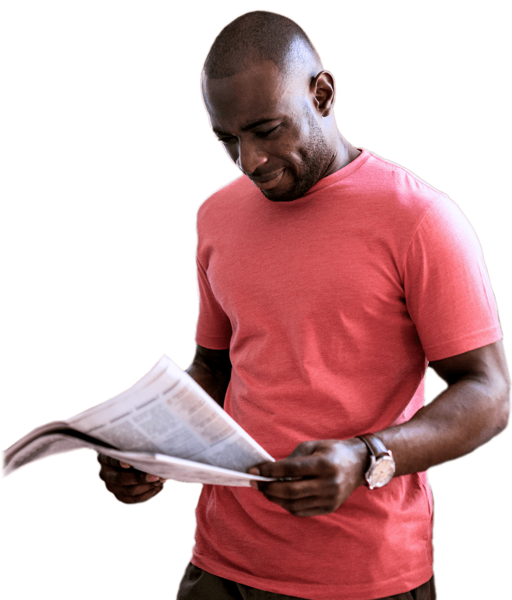 A Man Reading A Newspaper
