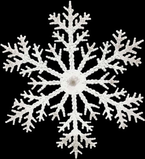 A White Snowflake On A Black Background