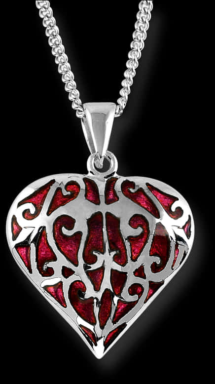 A Silver Heart With Red Enamel