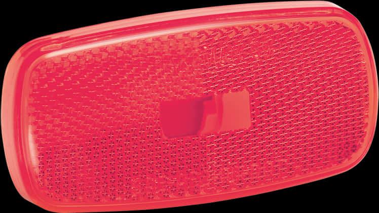 A Close-up Of A Red Reflector