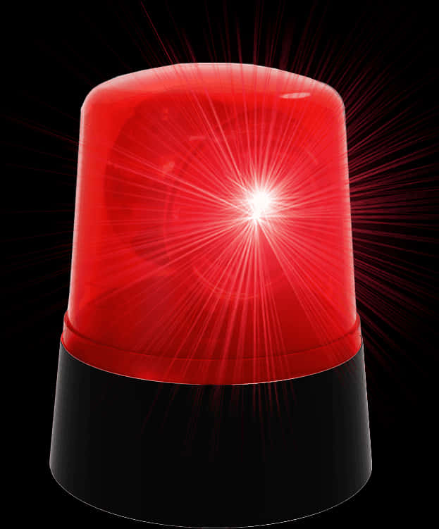 A Red Light On Top Of A Black Base