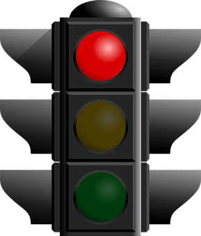 A Traffic Light With Red And Yellow Lights