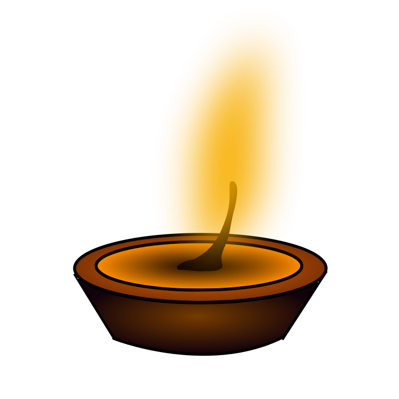 A Lit Candle In A Bowl