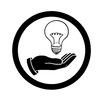 A Hand And Light Bulb On A Black Background