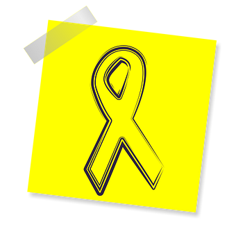 A Yellow Paper With A Black Ribbon On It