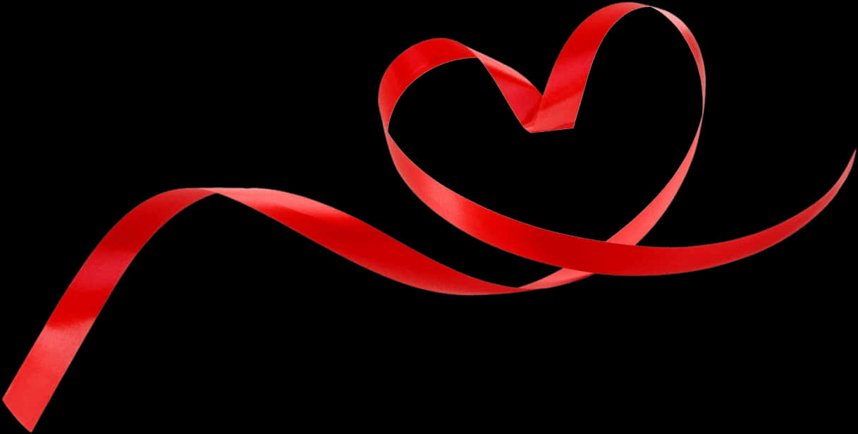 A Red Ribbon In The Shape Of A Heart