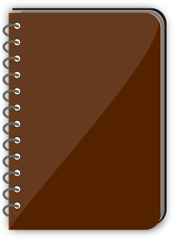 A Brown Notebook With A Spiral Bound
