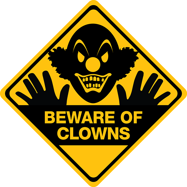 A Yellow Sign With A Clown Face