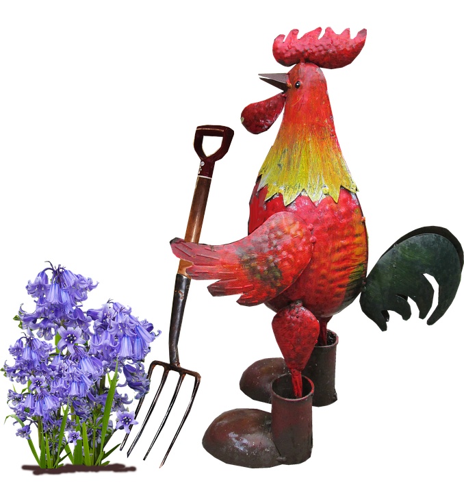 A Metal Rooster With A Pitchfork And Flowers