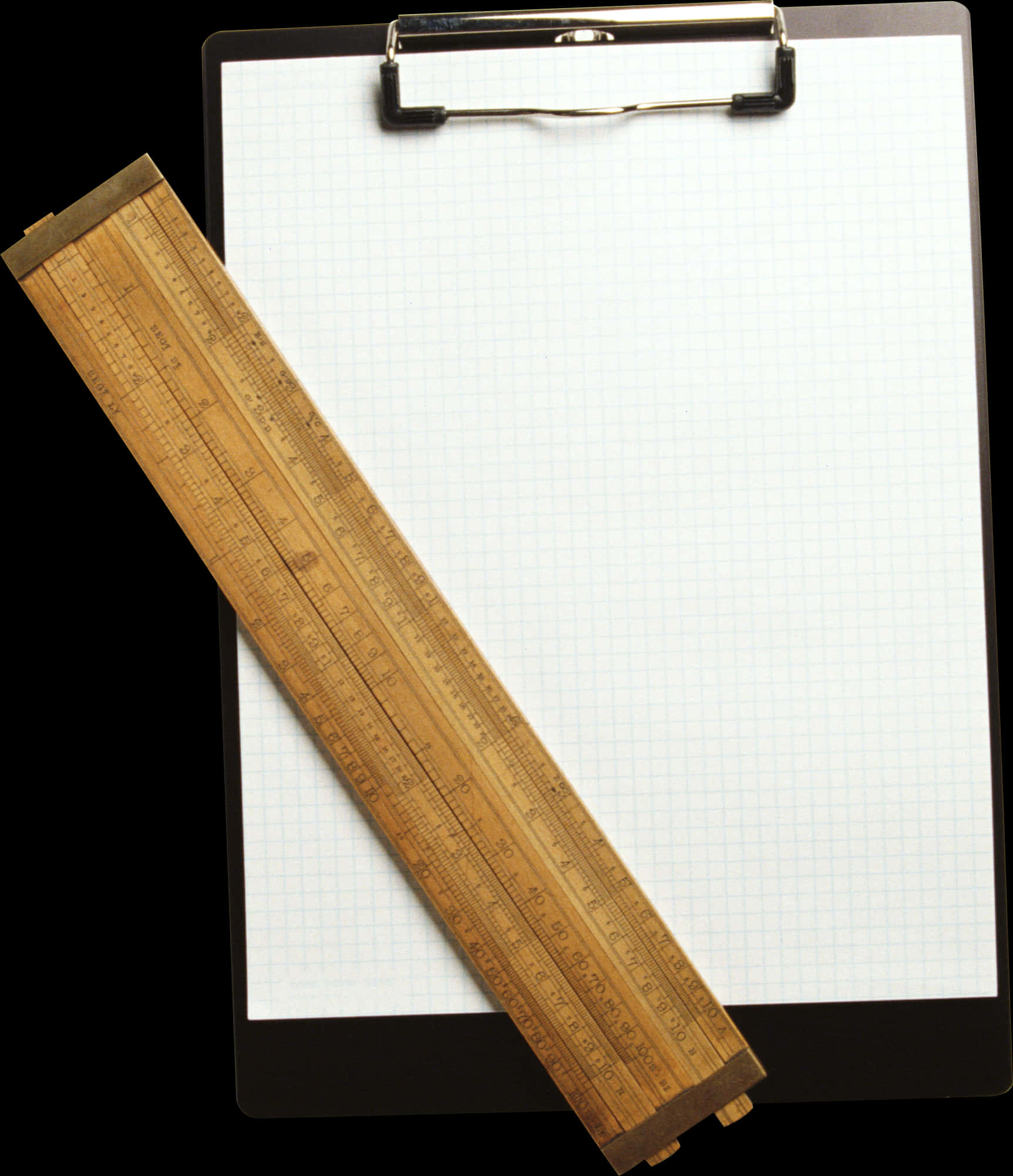 A Clipboard With A Ruler And A Piece Of Paper