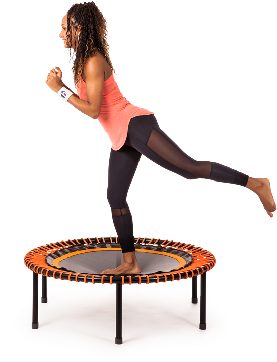 A Woman Standing On A Trampoline
