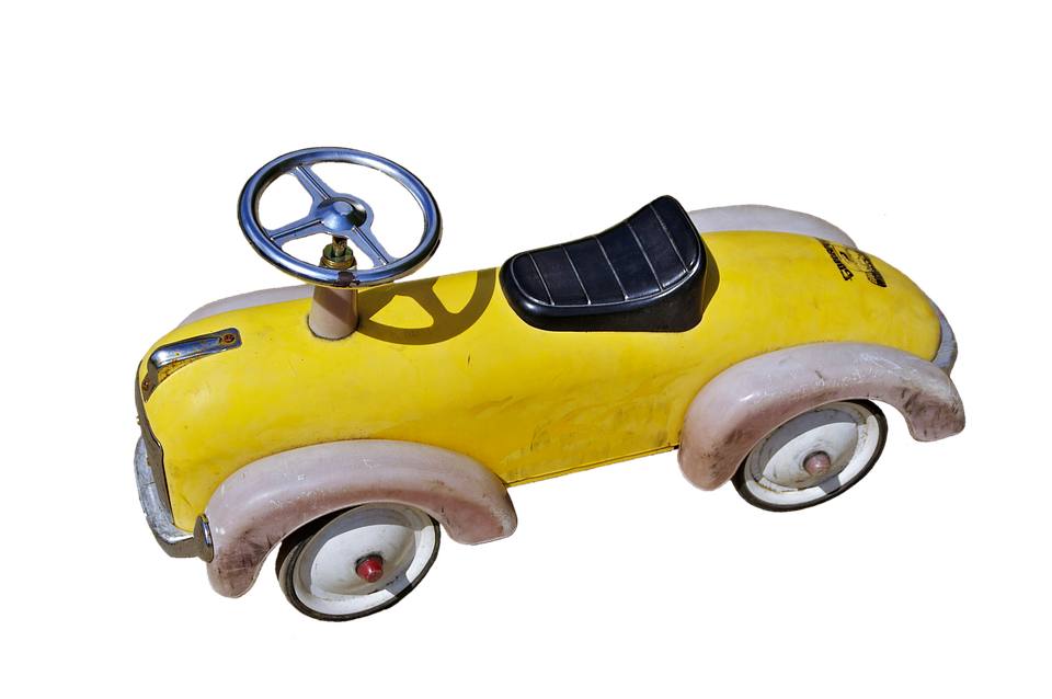 A Yellow And White Toy Car