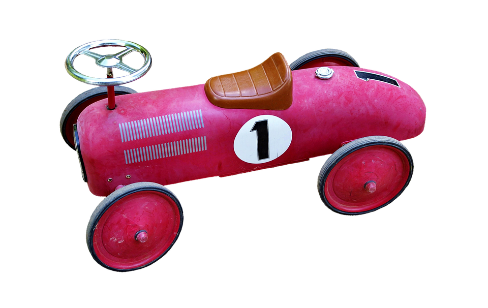 A Red Toy Car With A Number On It