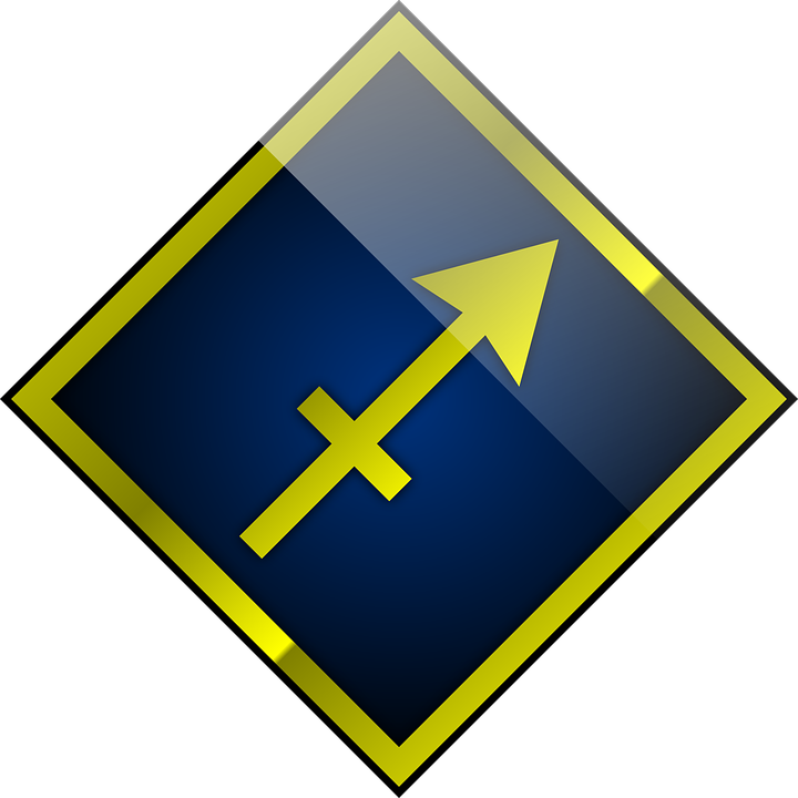 A Blue And Yellow Sign With A Yellow Arrow