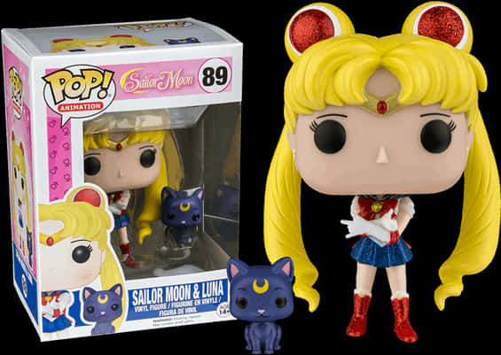 A Toy Figurine Of A Sailor Moon And A Cat
