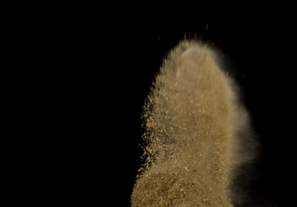 A Close Up Of A Cloud Of Sand