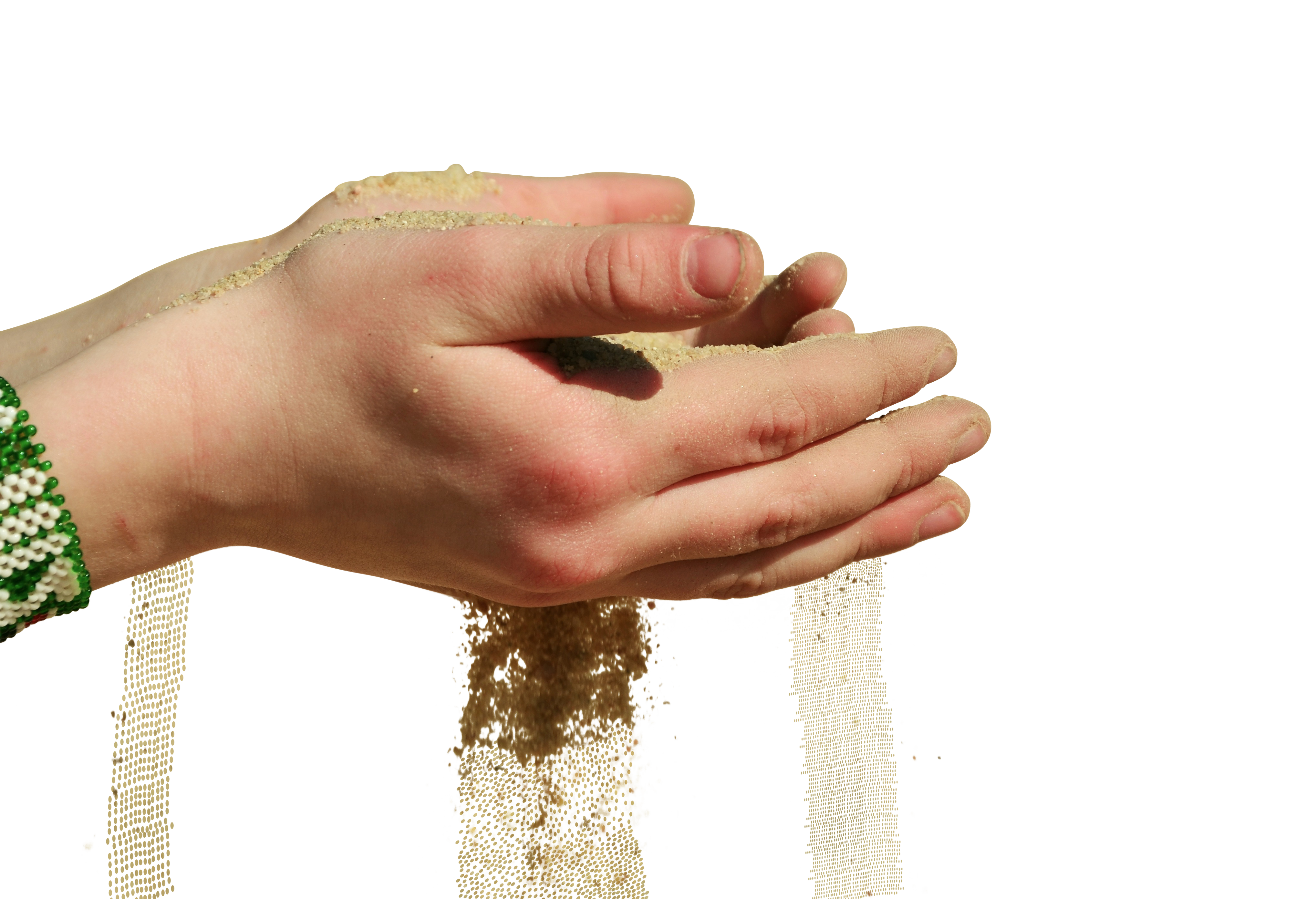 A Person's Hands Holding Sand