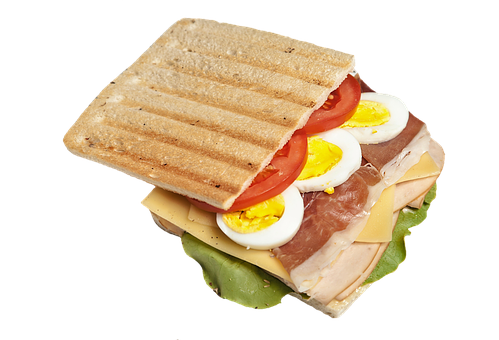A Sandwich With Meat And Eggs