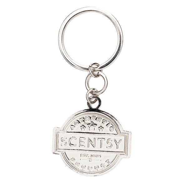 A Silver Key Chain With A Round Design