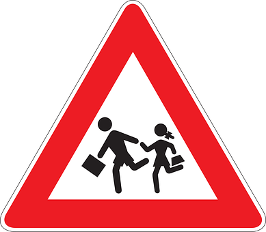 A Red Triangle Sign With Black And White Image Of People Crossing
