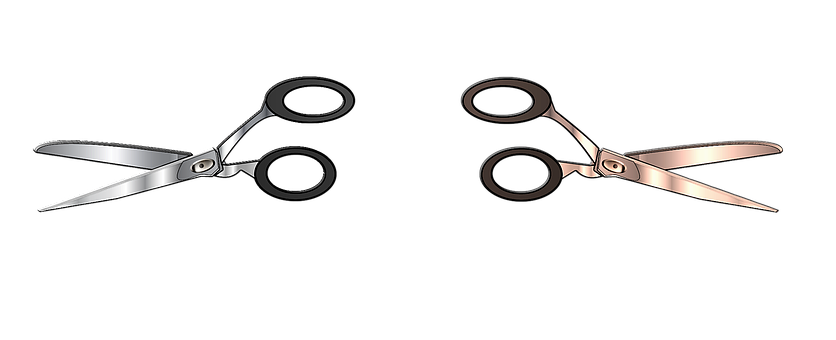 A Pair Of Scissors With Black And Silver Circles
