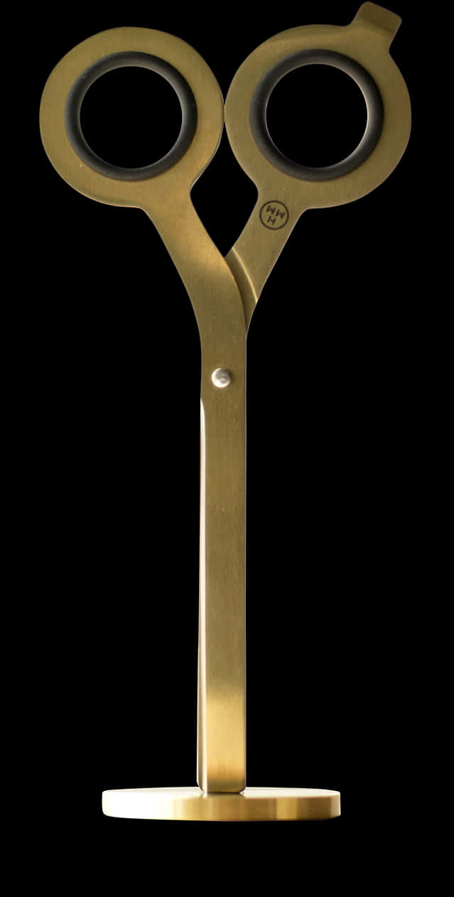 A Gold Object With A Black Background