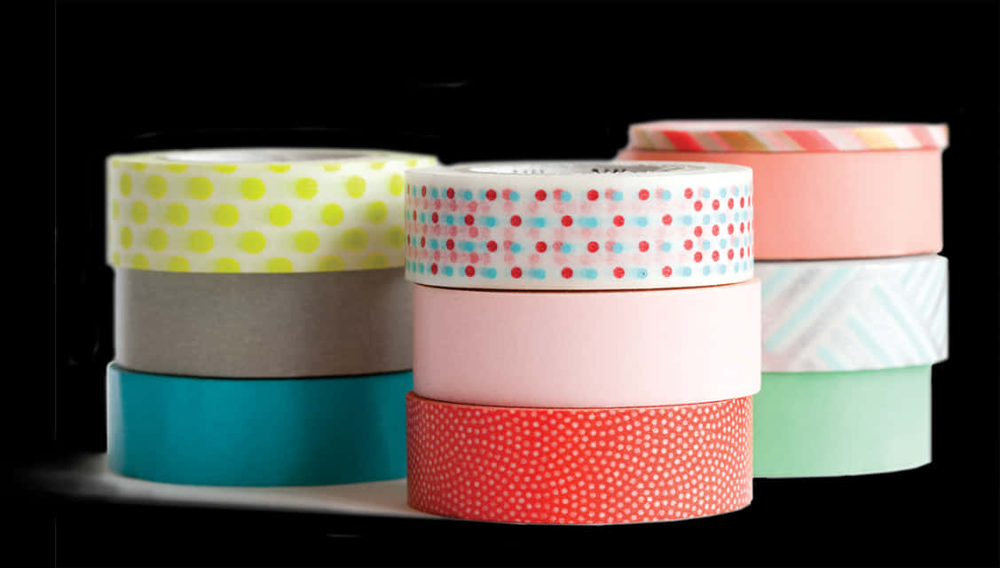 A Stack Of Colorful Tape Rolls