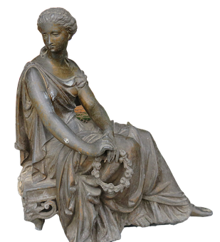 A Statue Of A Woman Sitting On A Bench