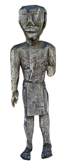 A Wooden Statue Of A Man