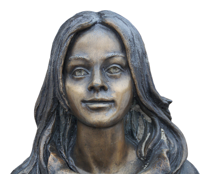 A Bronze Statue Of A Woman