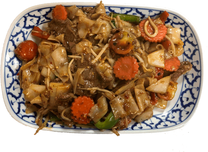 A Plate Of Food On A Black Background