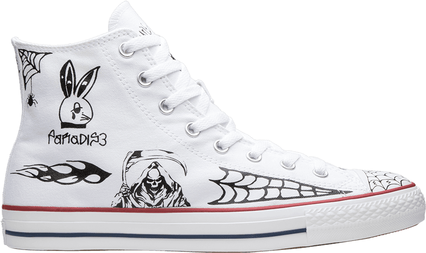 A White Shoe With Black And White Drawings On It