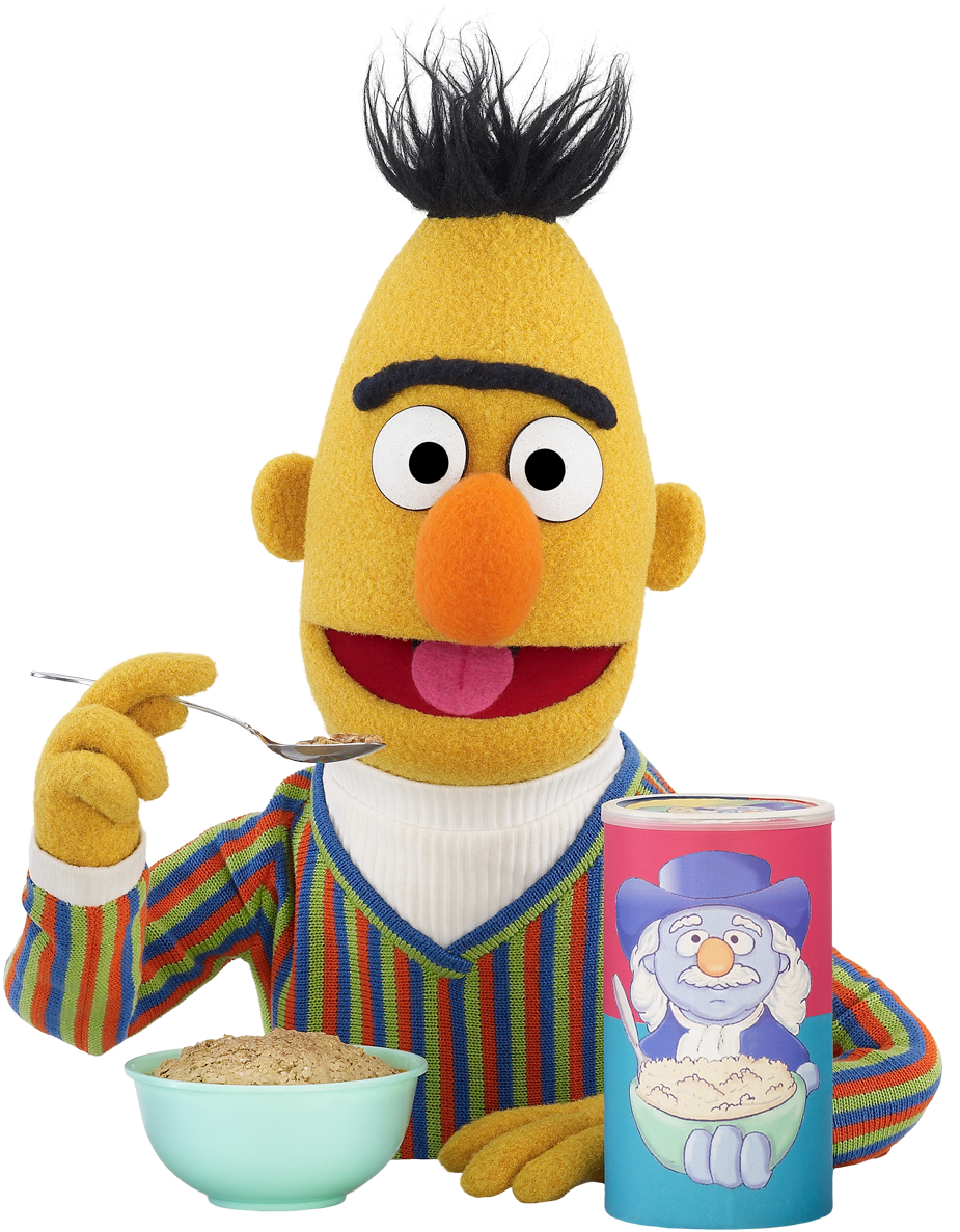 A Puppet Holding A Spoon And A Bowl Of Cereal