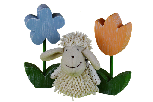 A Toy Sheep And Flowers