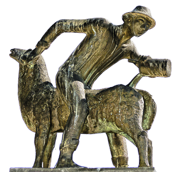 A Statue Of A Man Riding A Sheep