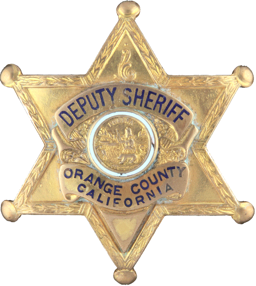 A Gold Star Shaped Badge With Blue Text