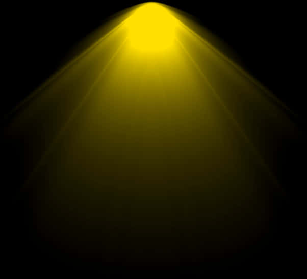 A Yellow Light Shining On A Black Background